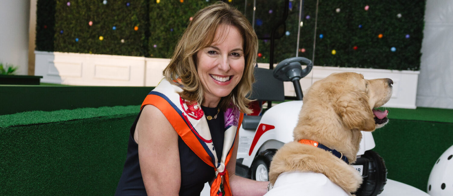 Debbie Sukin with Pawsitive Play “caddie,” Cohen ; Photo courtesy of Texas Children’s Hospital