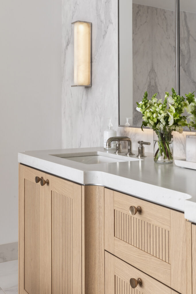 The vanity area at The Ritz Carlton Residences, The Woodlands sales office show of its details.