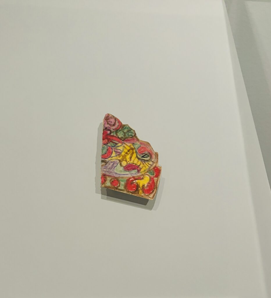 Janet Sobel's "Untitled," 1955, is a brooch Sobel designed using part of an envelope, crayon and a safety pin. (Photo by Ericka Schiche, Courtesy Leonard Sobel and Family)