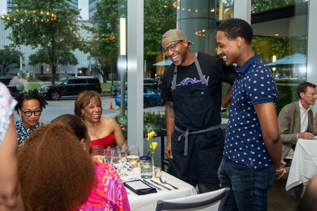Chef Chris Williams and Dancer Eric Best visiting with guests; Photo by Melissa Taylor