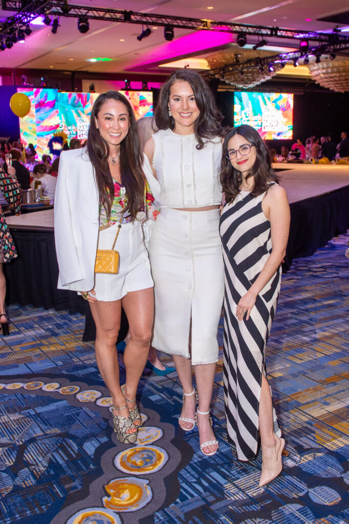 Jacy Cooper, Cinthya Reade, Elena Bueno at the Latin Women's Initiative fashion show and luncheon. (Photo by Jacob Power)