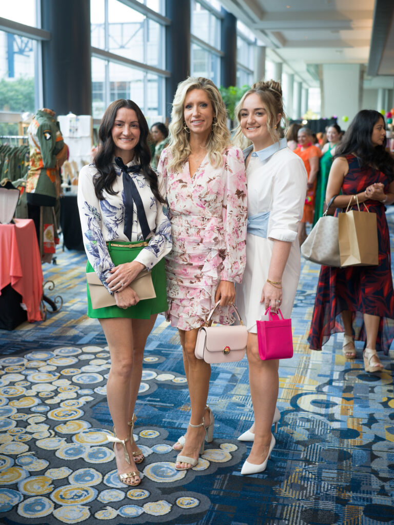 Pamela Espada, Danielle Miller, Amy Huitron at the Latin Women's Initiative fashion show and luncheon. (Photo by Daniel Ortiz)
