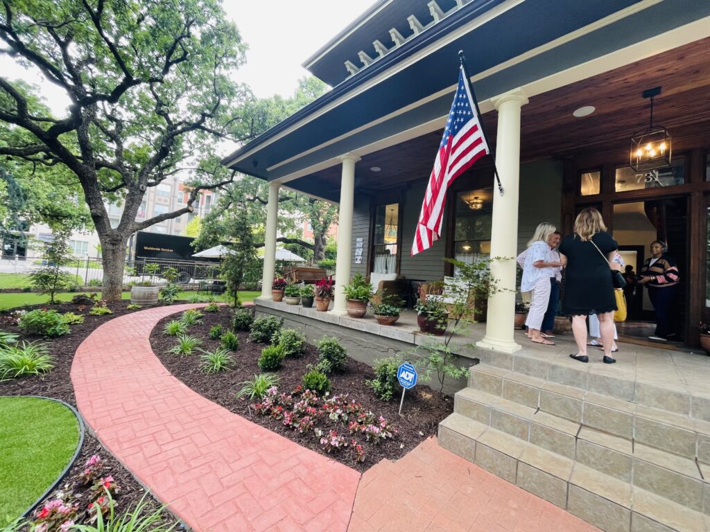 Sip a glass of wine on the front porch of this historic Fort Worth estate. (Photo by Courtney Dabney)