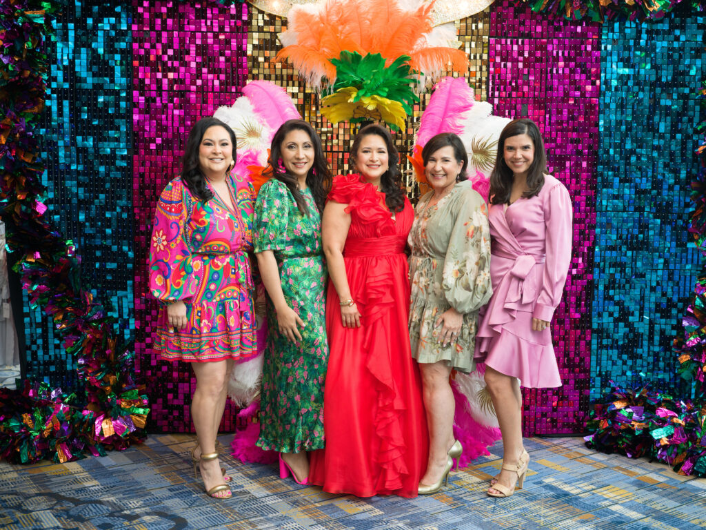 Vicki Luna, Jovanny Orellana, Patricia Garcia, Lisset Garza, Gloria Luna Bounds at the Latin Women's Initiative fashion show and luncheon. (Photo by Daniel Ortiz)