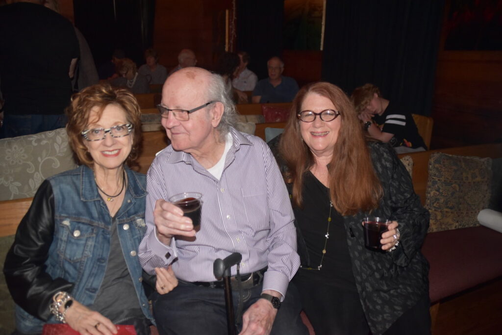 Anya Tish, artist H.J. Bott, arts writer Donna Tennant celebrate after a gallery opening.