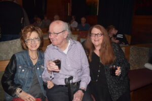 Anya Tish, artist H.J. Bott, arts writer Donna Tennant celebrate after a gallery opening.