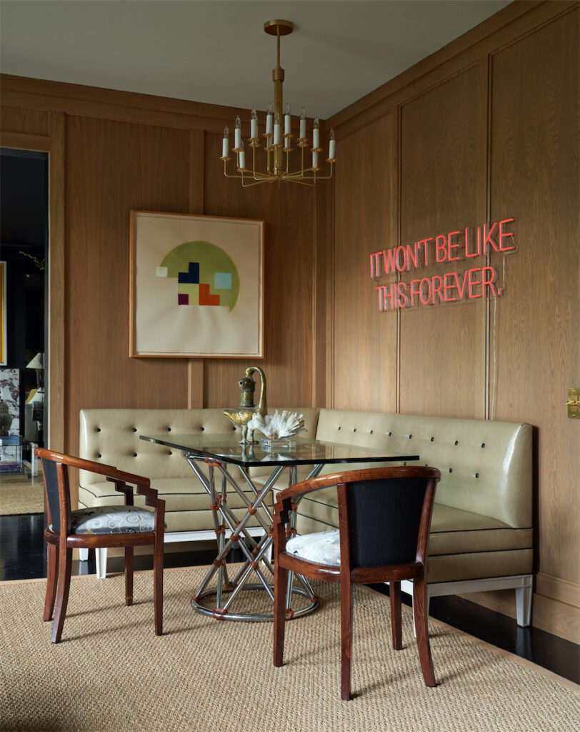 The breakfast nook’s custom chandelier is from O’Lampia, NY. Custom banquette designed by Catherine Brooks Giuffre. Vintage McGuire table with bronze duck from Area. Vintage chairs. (Photo by Pär Bengtsson)