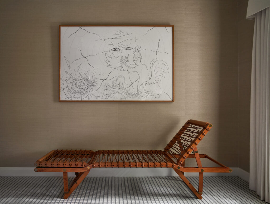 A striking vignette in the main bedroom with a vintage Hermès bench, one of Dean Giuffre's favorite pieces, and an early drawing by Texas artist James Surls. (Photo by Pär Bengtsson)