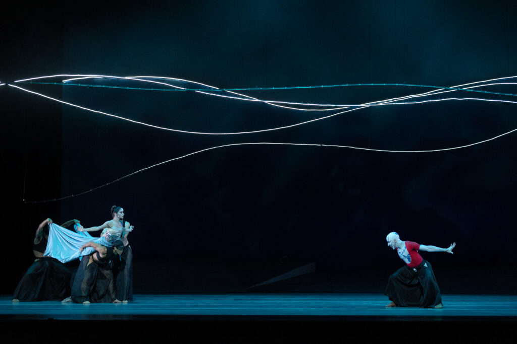 Houston Ballet principal Karina González as The Little Mermaid/His Creation and first soloist Harper Watters as The Sea Witch, with Artists of Houston Ballet in John Neumeier’s "The Little Mermaid." (Photo by Amitava Sarkar)