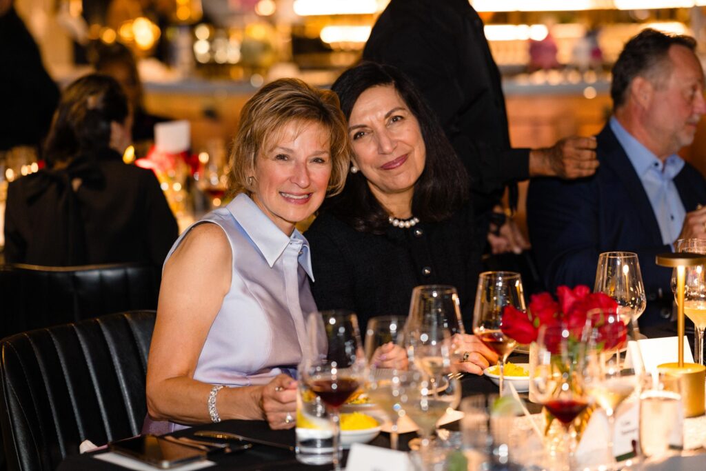 Barbra Feigin (l) and Huda Zoghbi (r) at Amrina.  Dr. Zoghbi spoke about the work that the Duncan NRI is doing.