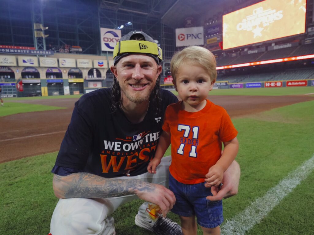 Astros closer Josh Hader and his 2-year-old son Lucas share a moment on the field. (Photo by F. Carter Smith)