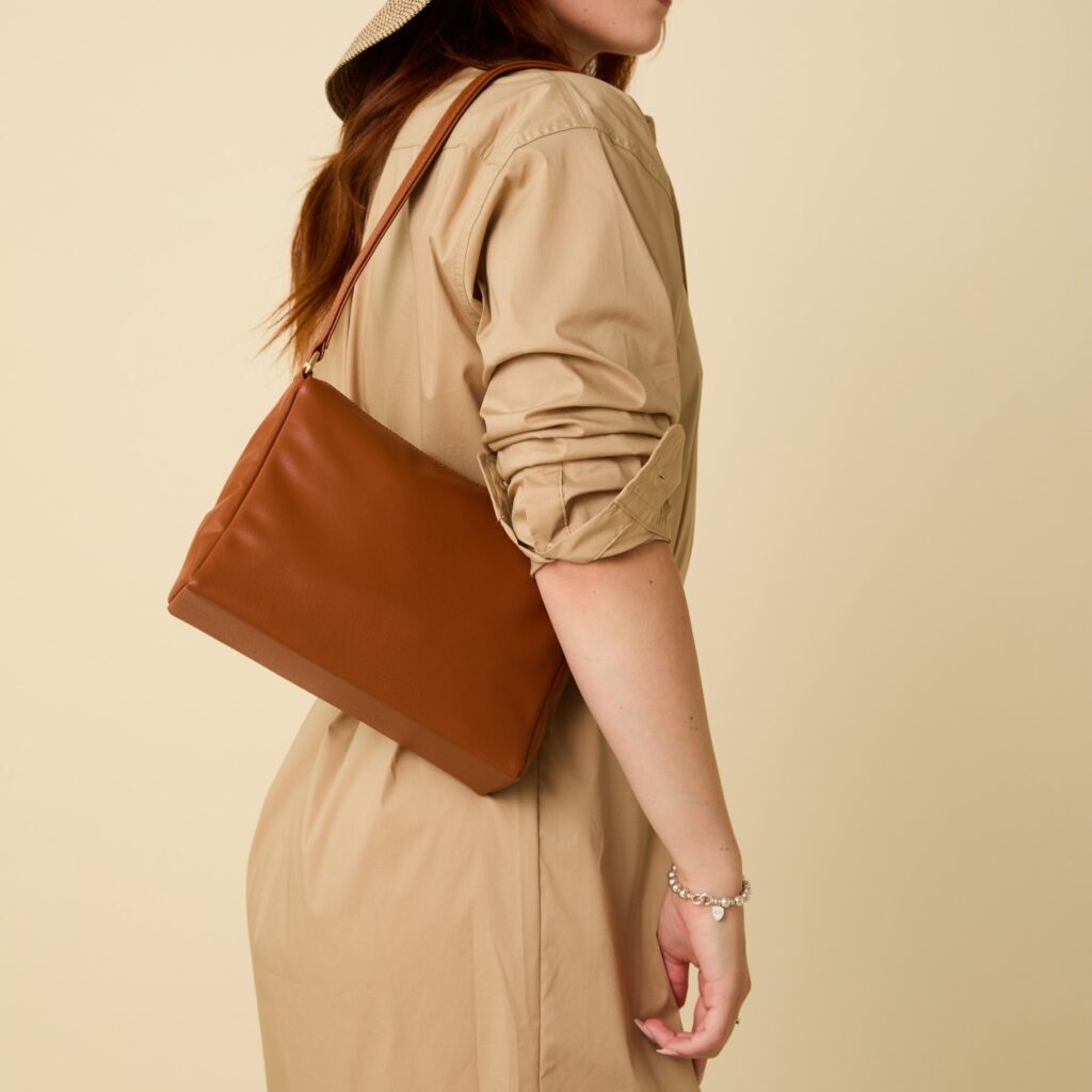 The Gala Shoulder Bag is made from recycled apples, blending luxury and sustainability in a sleek, eco-friendly design. (Photo courtesy Allegorie)