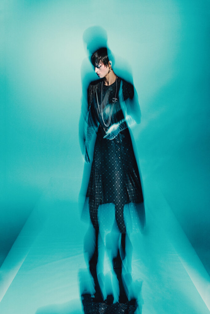 Chanel print silk crepe de chine dress, gloves $1,450, necklace $1,475, belt $1,650, earrings $675, and boot $2,050 at Chanel Highland Park Village.  (Photo by Fernando Rodriguez)