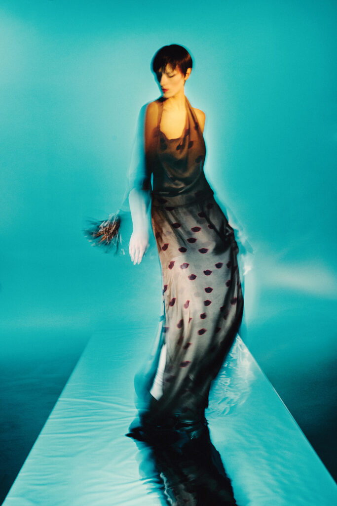 Stella McCartney draped lips dress $2,700, and stretch boot $1,250, at Neiman Marcus, Saks Fifth Avenue, Stanley Korshak, farfetched.com, mdaoperandi.com, net-a-porter.com.  (Photo by Fernando Rodriguez)