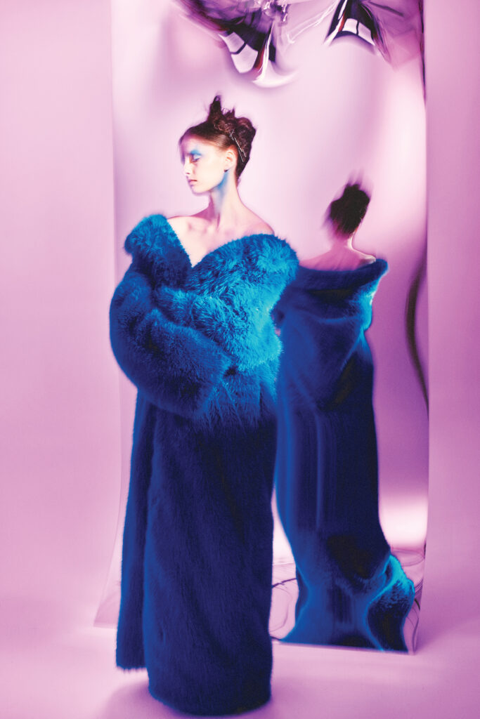 Balenciaga off-shoulder coat in royal blue $7,590, at the Balenciaga boutique, Neiman Marcus, farfetched.com, modaoperandi.com.  (Photo by Fernando Rodriguez)