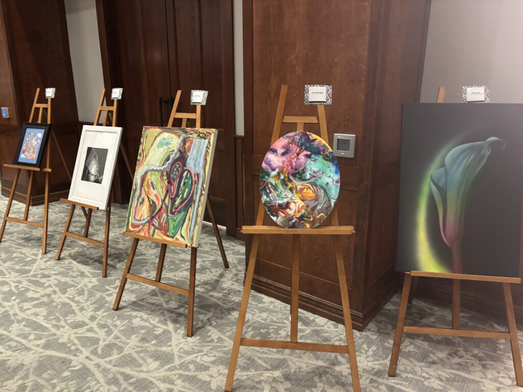 A selection of visual art, curated by Joseph Staley, was exhibited at the YTA Classic Cabaret evening on October 24 at The Woodlands Country Club's Palmer course. (Photo by Laura Landsbaum)