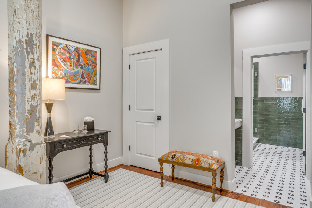 Nutt House Hotel's iconic cypress columns amazingly survived the fire damage.