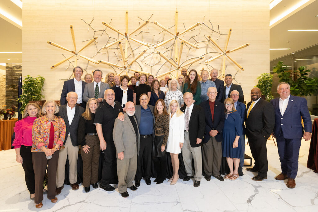 Some of the 106 previous recipients of Interfaith's Hometown Heroes award at the reception recognizing the 2025 recipients at the Howard Hughes tower on November 6. (Photo courtesy of Mauricio Photography)
