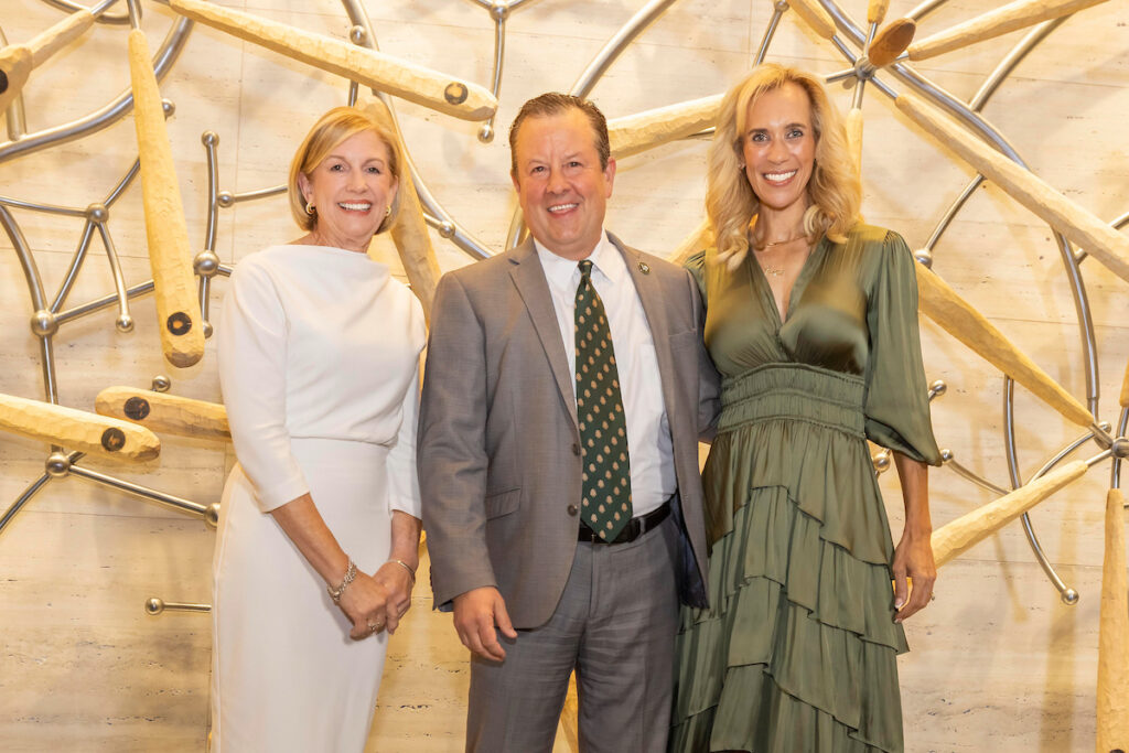 Newly selected Hometown Hero Nick Wolda (center) will be inducted into the Hometown Heroes Hall of Fame at The Woodlands 2025 Celebration of Excellence gala benefiting Interfaith of The Woodlands. Linda Nelson (left) and Interfaith President and CEO Missy Herndon introduced the newest selections on November 6. (Photo courtesy of Mauricio Photography)