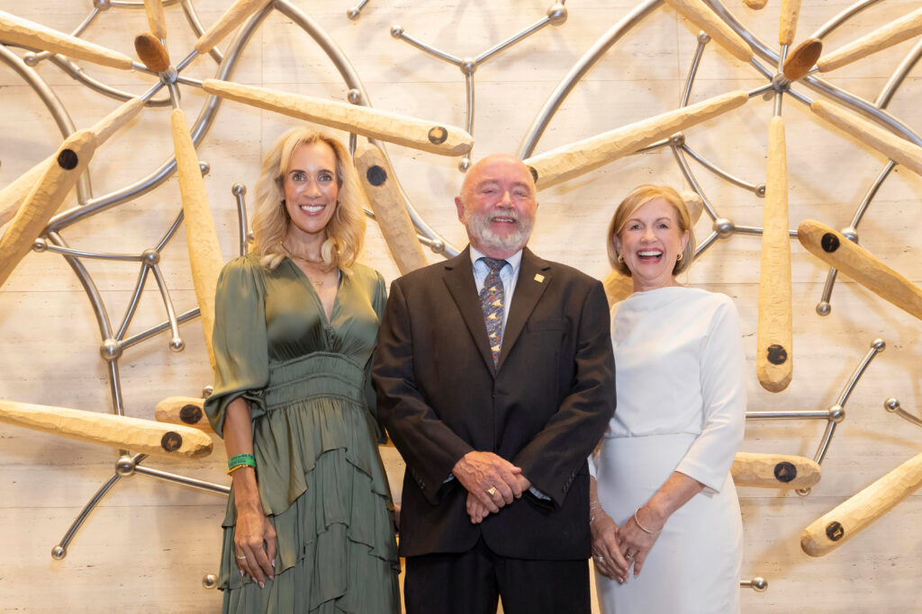 Newly selected Hometown Hero Jim Wendt with Missy Herndon (left) and Linda Nelson at the Howard Hughes tower on November 6. (Photo courtesy of Mauricio Photography)