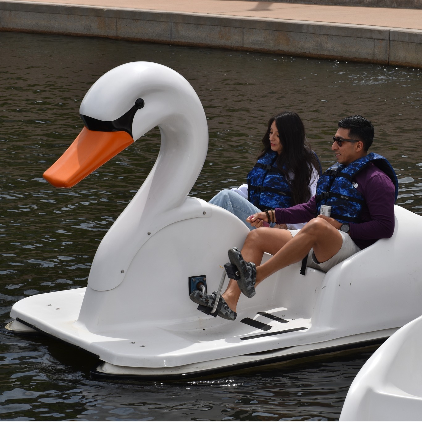 One of the surprising date night options in The Woodlands is taking a romantic swan ride through The Woodlands Waterway.