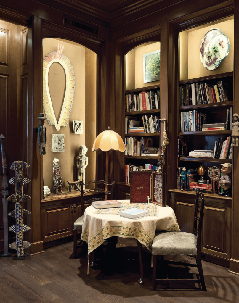 Marilyn Oshman house: One corner of the library shows its owner's mania for volumes, history, antiques, vintage 20th-century toys, and art of all regions, periods, and continents. (Photo by Jack Thompson)