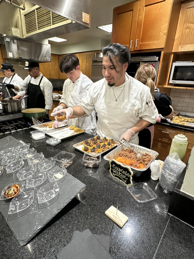Chefs from the Central Market Cooking School prepare their truffle dishes for the Truffle Masters preview party. (Photo by Shelby Hodge)