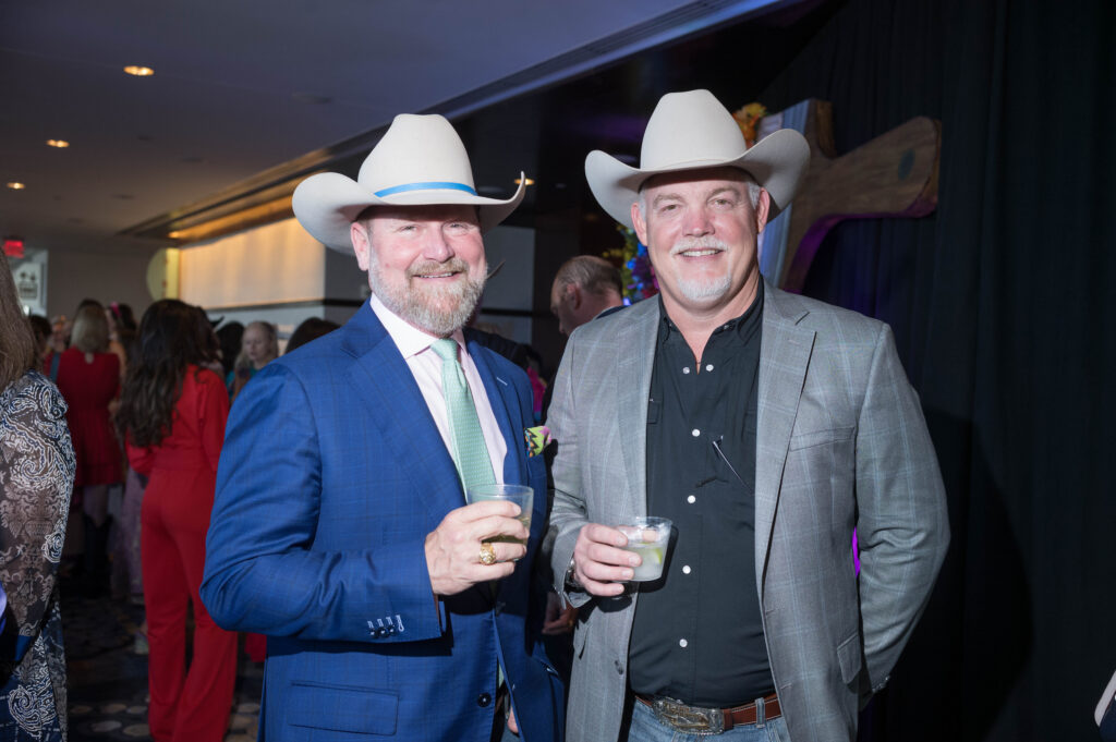 Jimmy Guinn, Mike Kohler at the 25th annual Trailblazers luncheon. (Photo by Daniel Ortiz)