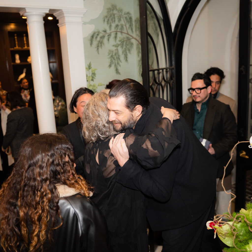 Lucia Simek greets Brian Thoreen. (Photo by A Sea of Love)