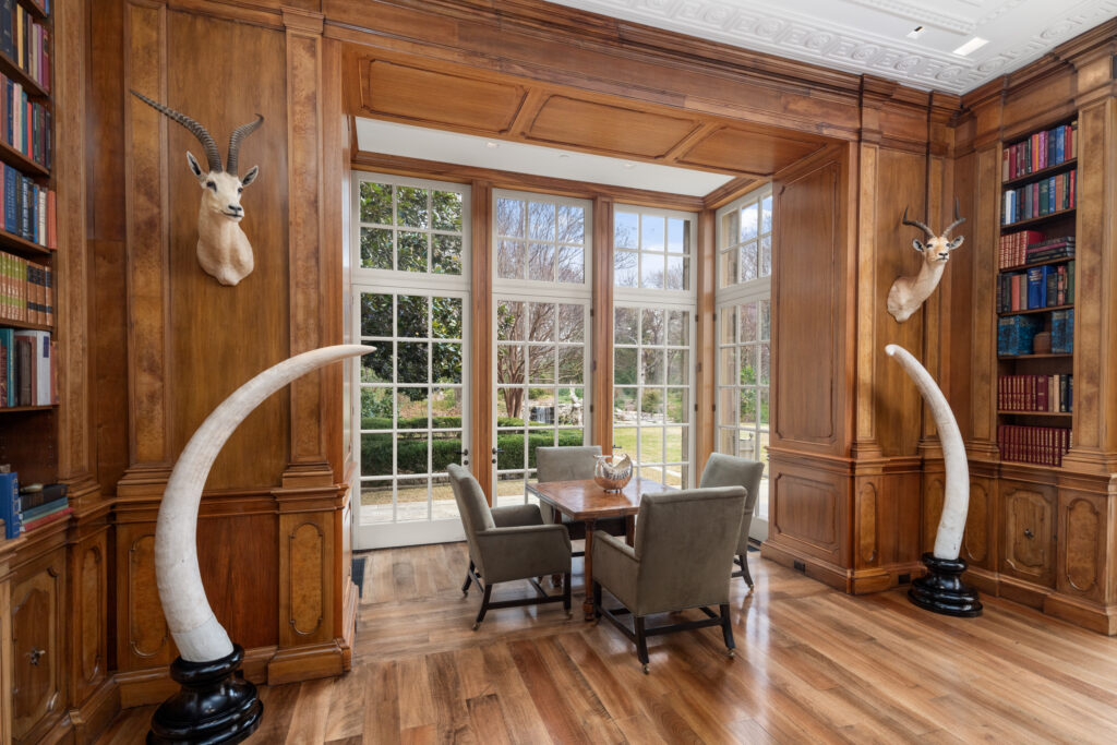 A library in Europe with 1820s paneling was purchased, shipped to America, and reassembled on site. (Photo by Briggs Freeman Sotheby's International Realty)