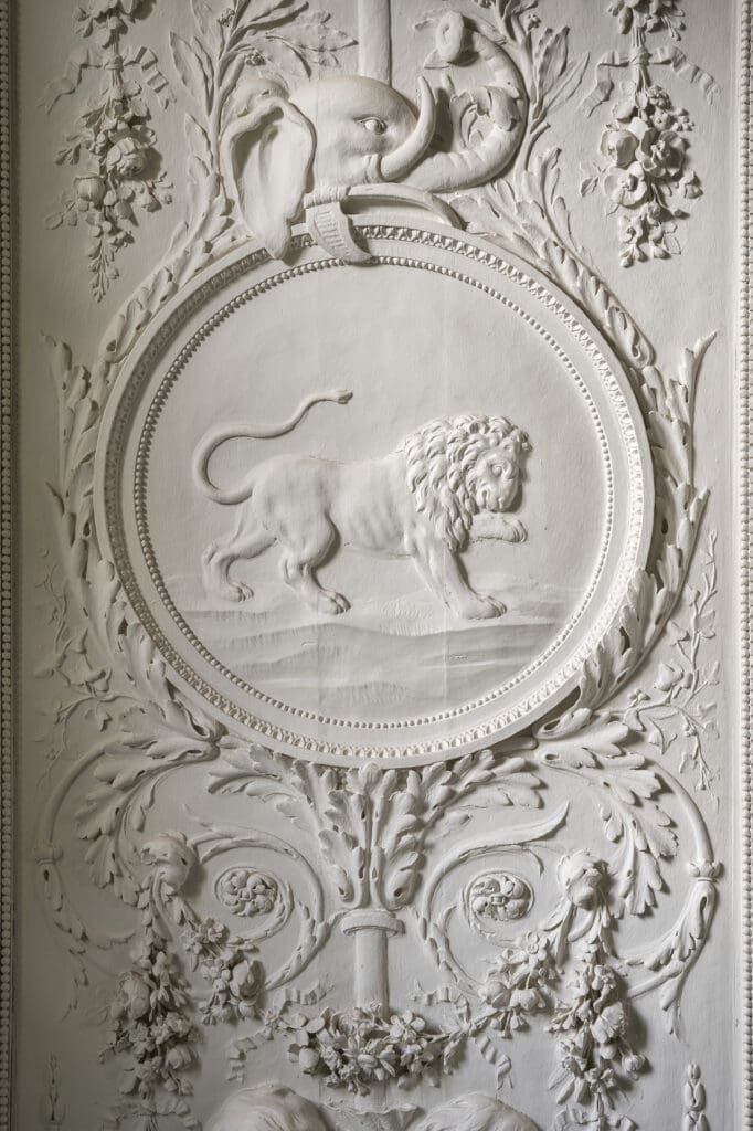 A close-up of Claude-Nicolas Ledoux's "Four Continents" panels