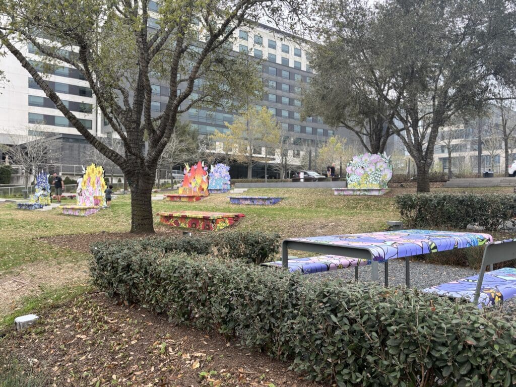 In addition to benches, nearby picnic tables at City Place are covered in flowers from Graphic Rewilding. (Photo by Laura Landsbaum)