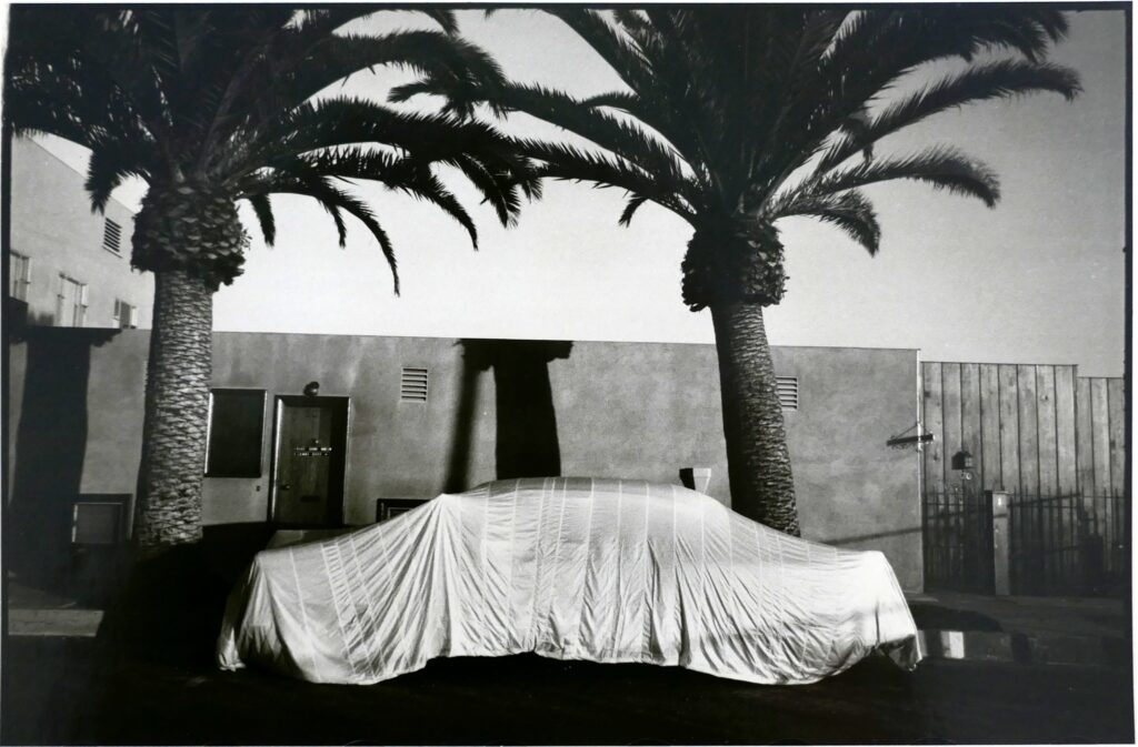 Robert Frank's "Covered Car, Long Beach, California," 1955-6, gelatin silver print, Live Auction Lot 8 (Courtesy Estate of Peter C. Bunnell)