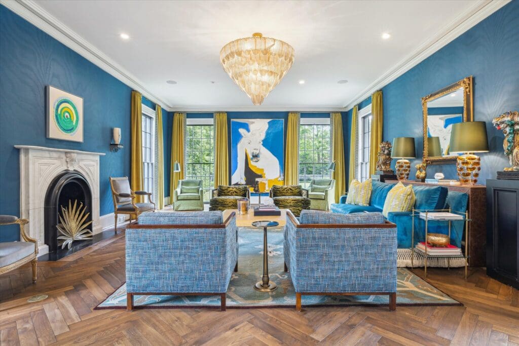 The formal living room at 3 Remington Lane blends contemporary esthetics with the traditional bones of the house. (Photo by TK Images)