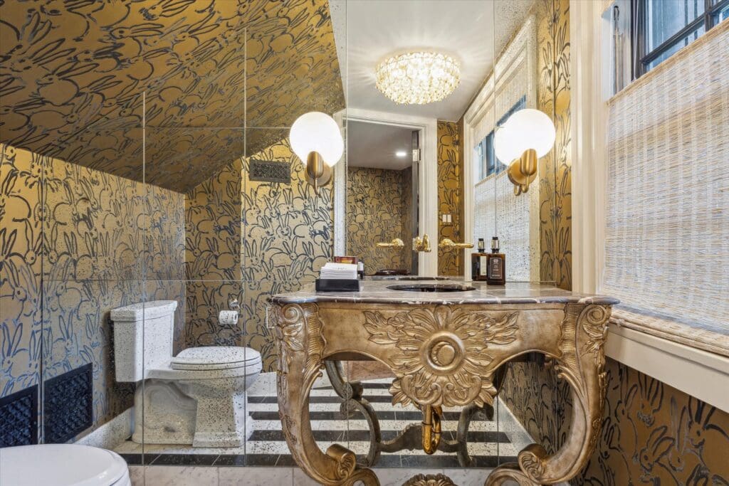 Another view the half bath playfully dressed in Hunt Slonmen's bunny wallpaper. (Photo by TK Images)