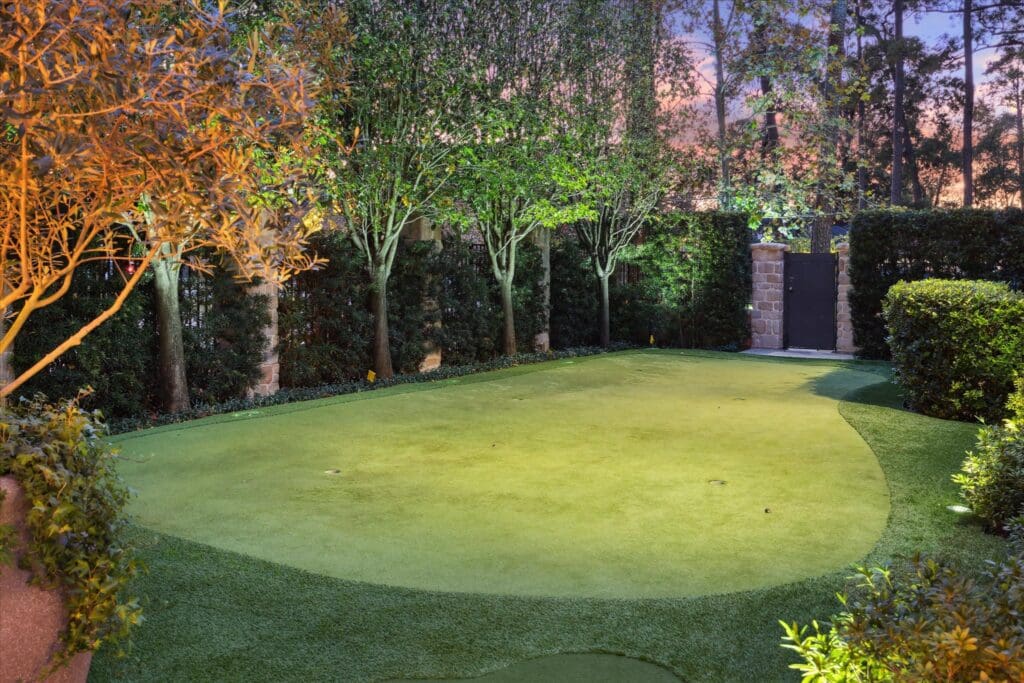 The turfed putting green on the grounds at 220 Merrie Way Lane (Photo by TK Images)