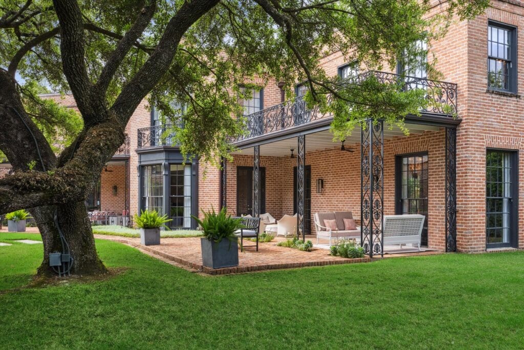 Ancient oaks set the genteel ambience of this historic home in Shadyside. (Photo by TK Images)