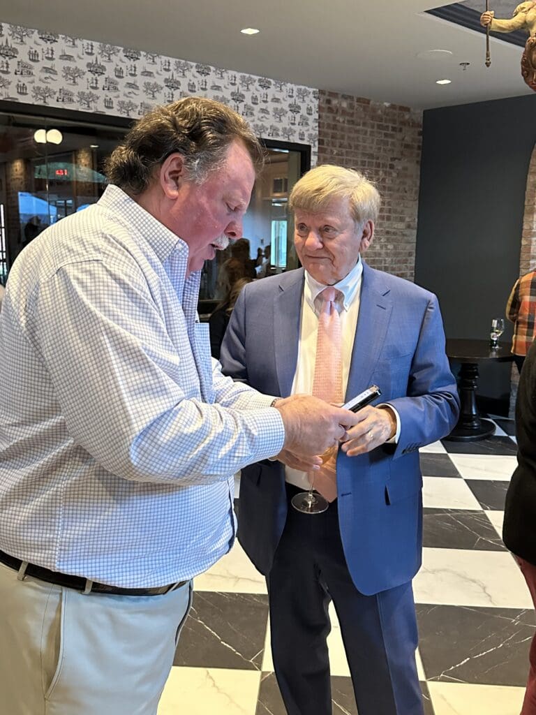 Alex Brennan-Martin, Rusty Hardin at Brennan's Houston Courtyard Bar opening festivities. (Photo by Shelby Hodge)