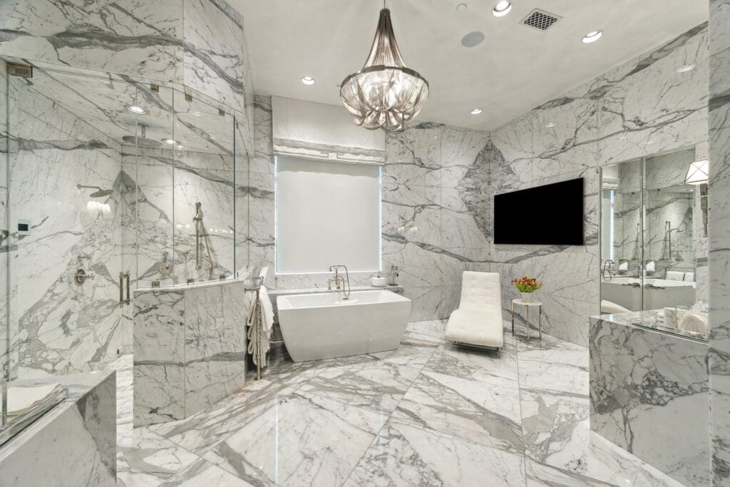 All marble, all around in the primary bath at 220 Merrie Way (Photo by TK Images)