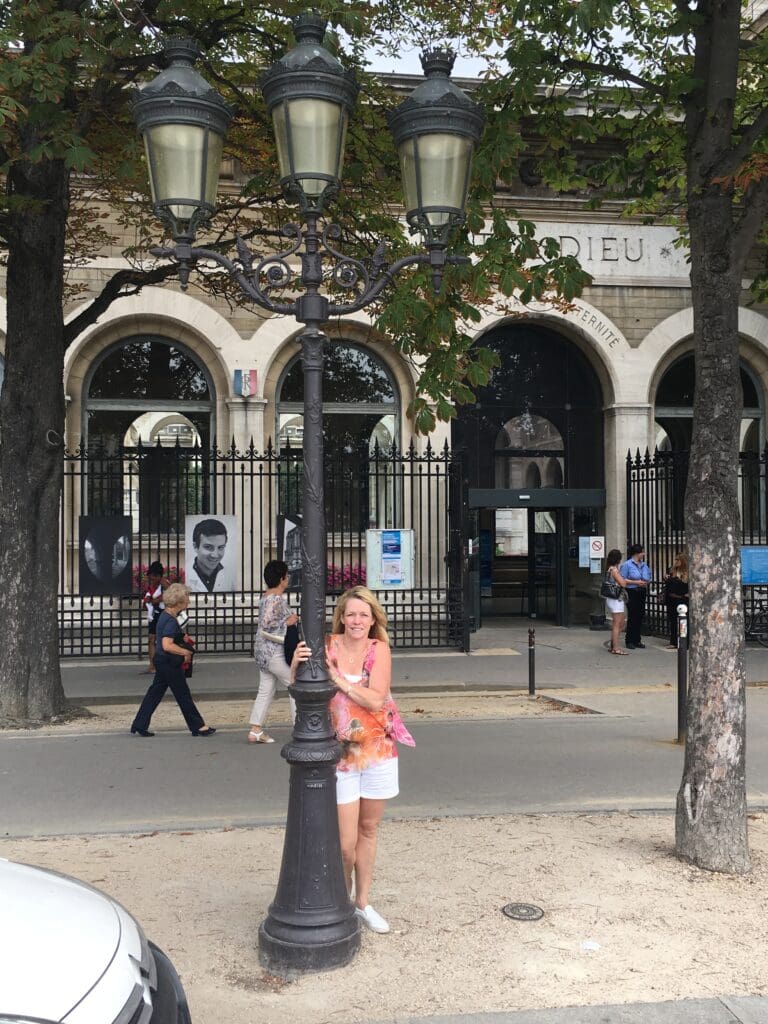 Robin Brennan-Martin in Paris with the famous gas lamps like those that grace Brennan's Houston (Courtesy photo)