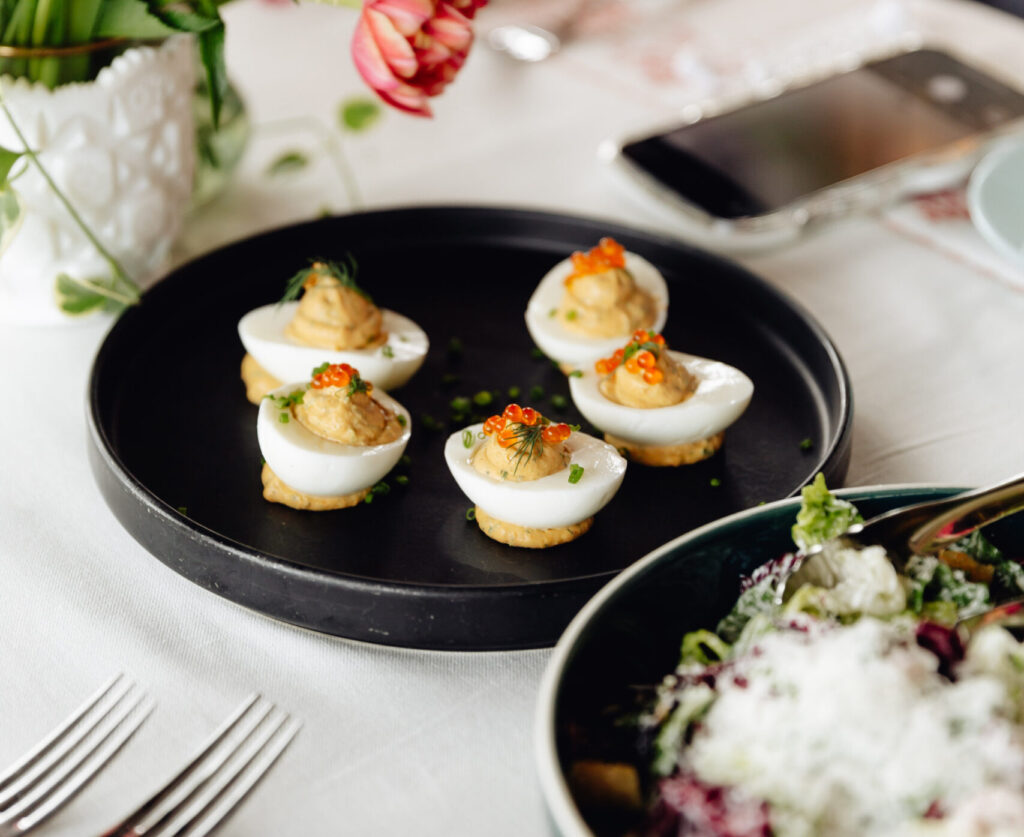 Deviled eggs topped with trout roe. (Photo by Vanessa Christina Chavez)