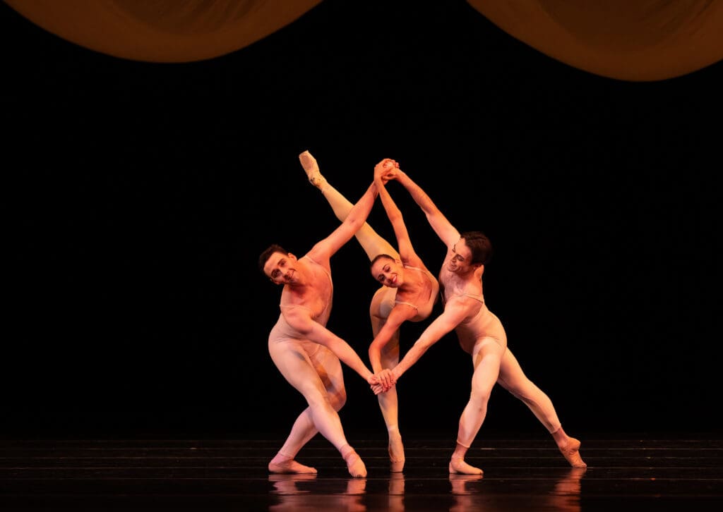 Houston Ballet first soloist Tyler Donatelli, soloist Aaron Daniel Sharratt, and Corps de Ballet dancer Riley McMurray in Ben Stevenson’s "Four Last Songs" (Photo by Amitava Sarkar. Courtesy Houston Ballet.)