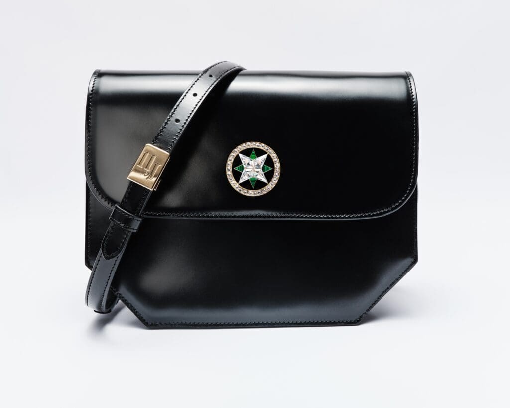 The Clementine handbag from 11 Juillet, the èclat de joie (medallion) sparkling with diamonds and malachite