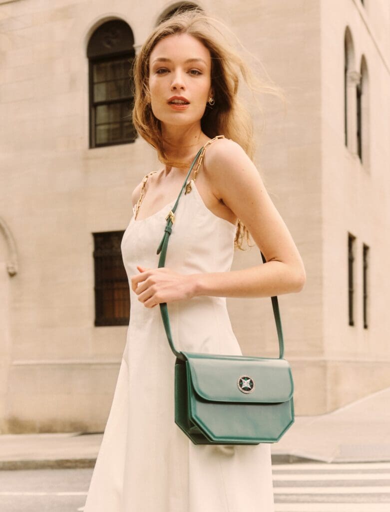 The Clementine bag by 11 Juillet in emerald green.