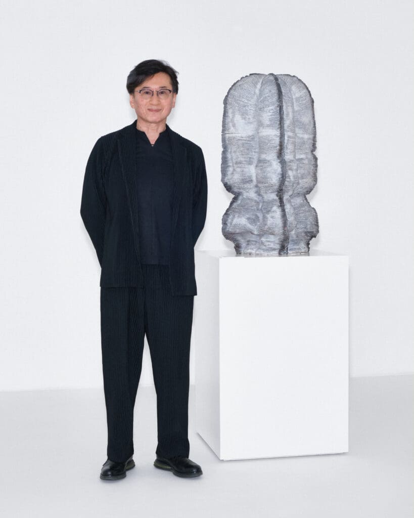 Kunimasa Aoki with his "Realm of Living Things 19," 2024, the winner of The Loewe Foundation 2025 Craft Prize (Courtesy Loewe) 