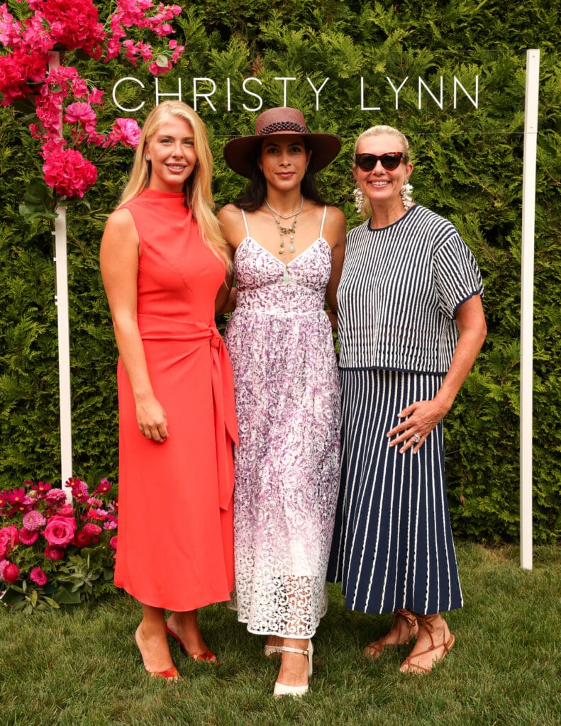 Ashley Zachem, Carolina Rizk, Katherine Birch at the Christy Lynn poolside luncheon in Southampton (Photo by BFA / Kevin Czopek)