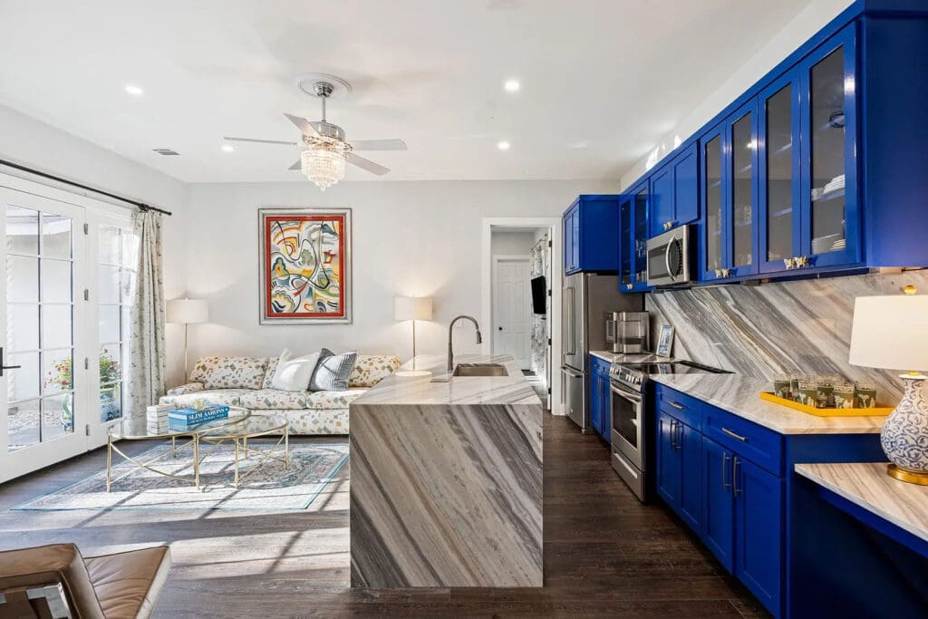 The 1,250-square-foot guest house features a full kitchen, living and dining areas, as well as a walk-in laundry room. (Photo by Allie Beth Allman & Associates)