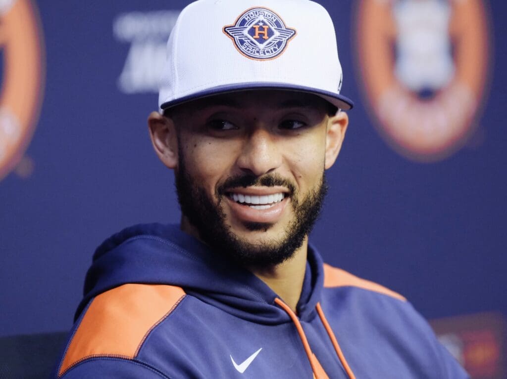 Carlos Correa is excited to be back with the Houston Astros and in World Series contention again. (Photo by F. Carter Smith)
