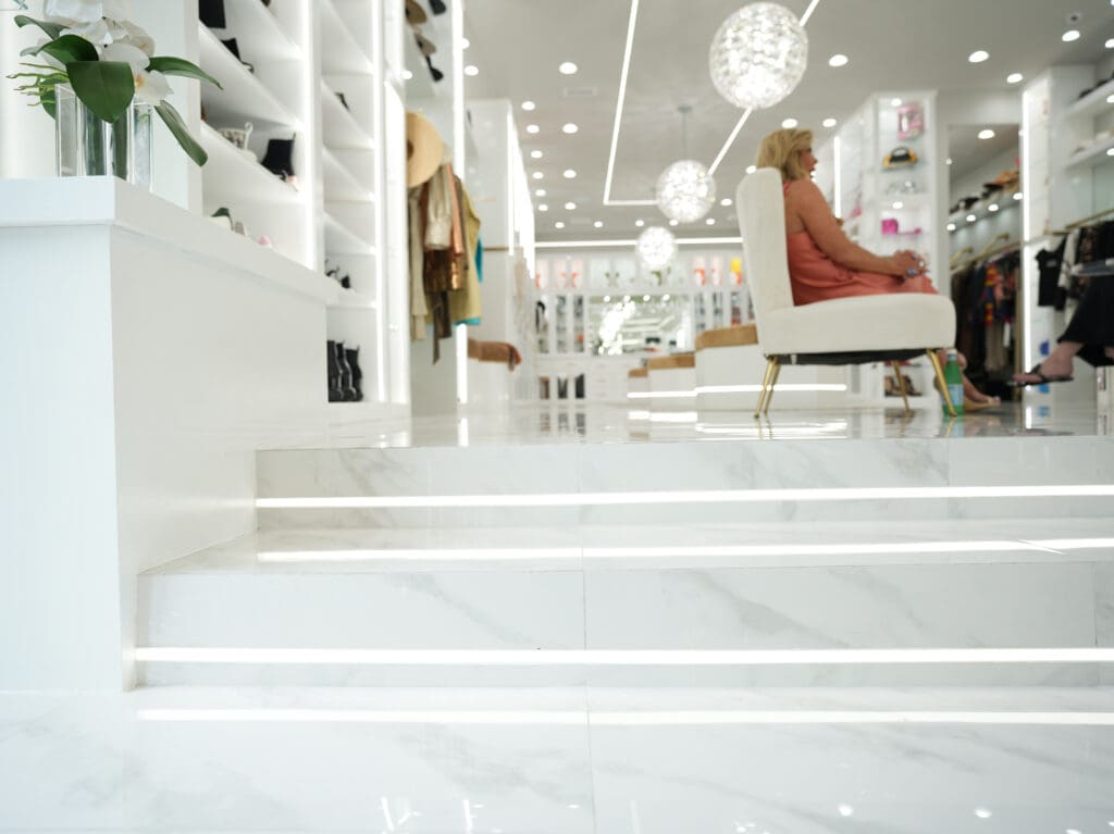 Strip lighting throughout the closet, ceiling and stairs keep everything well-lit.