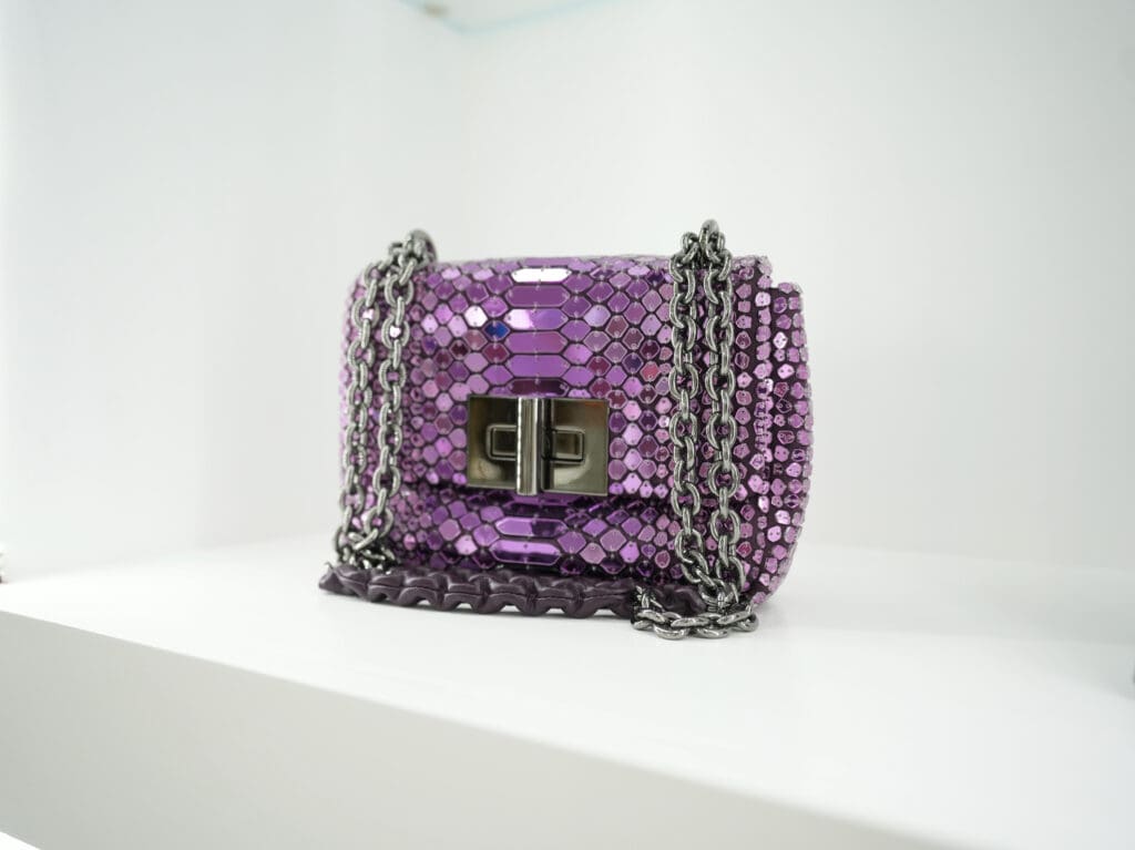 The Fendi Baguette Sequin Mini Purple Chain Bag.